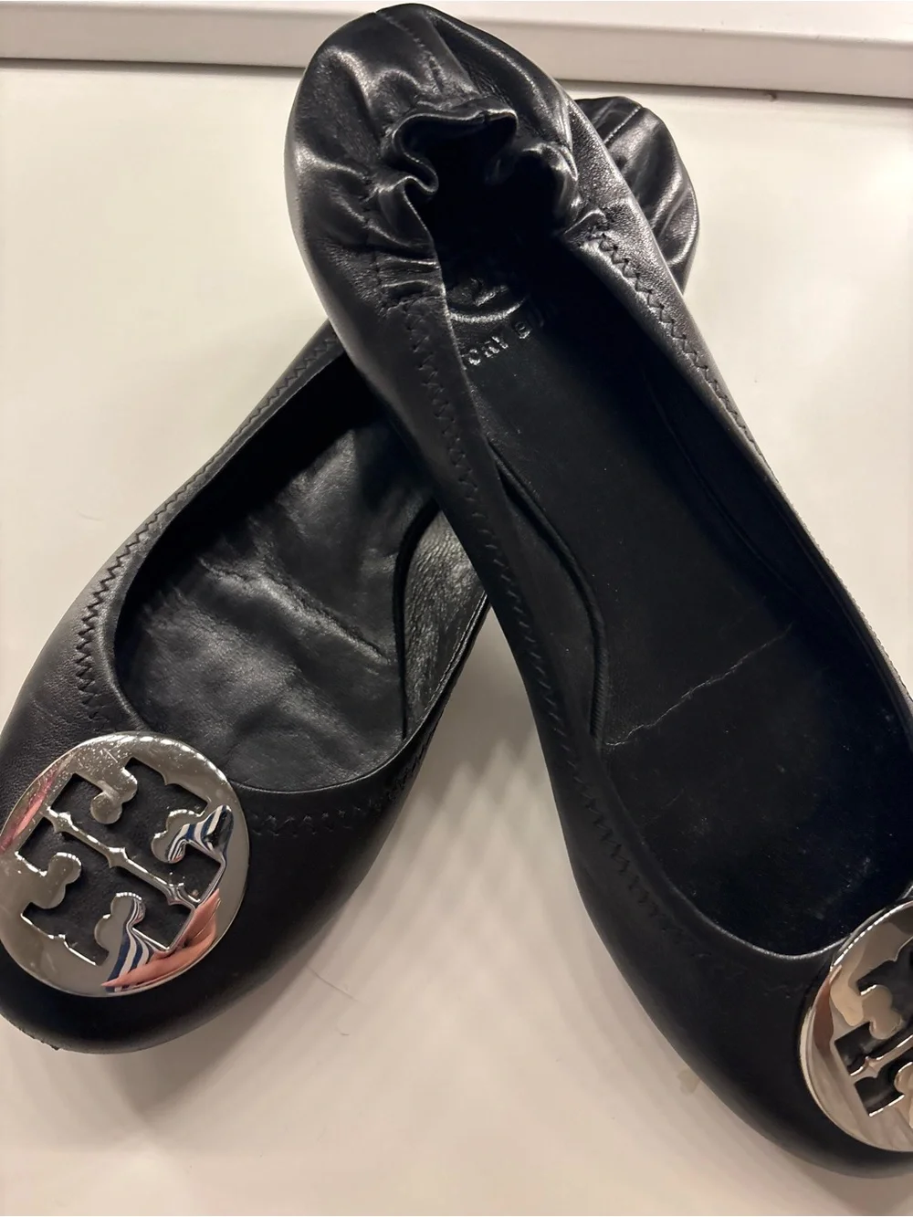 Tory Burch Black Leather Ballet Flats with Silver Emblem